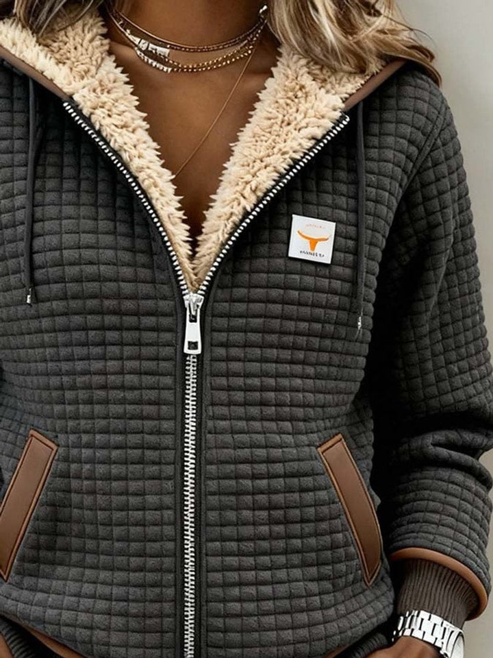 Silvana™ | Prošívaná bunda s kapucí, zapínáním na zip a hřejivou podšívkou Sherpa